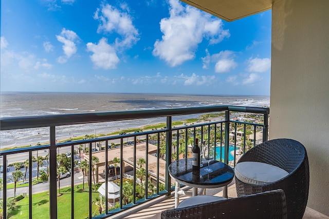 5220 Seawall Blvd Unit 1232, Galveston, TX 77551 - balcony featuring view of water and beach