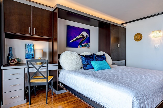 5220 Seawall Blvd Unit 1232, Galveston, TX 77551 - bedroom with wood finished floors