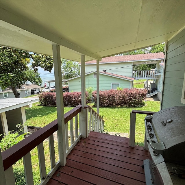 11 Sherry Ln, Coldspring, TX 77331 - wooden porch featuring a lawn and grilling area