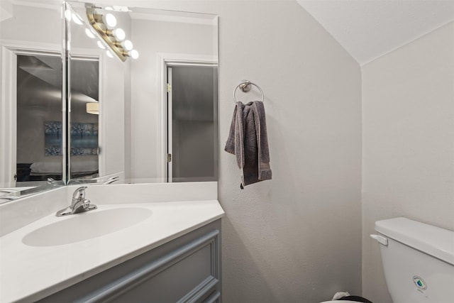 215 Post Office St Unit 1208, Galveston, TX 77550 - half bathroom with vanity, toilet, and vaulted ceiling