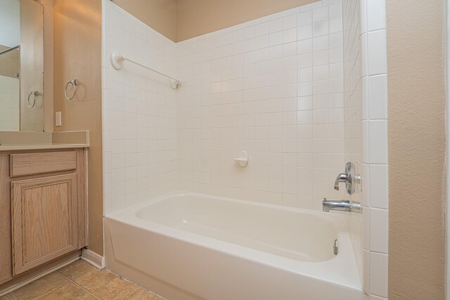 2212 Naomi St, Houston, TX 77054 - bathroom with tub / shower combination, vanity, and tile patterned floors