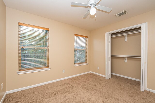 2212 Naomi St, Houston, TX 77054 - unfurnished bedroom featuring carpet floors, a closet, and a ceiling fan