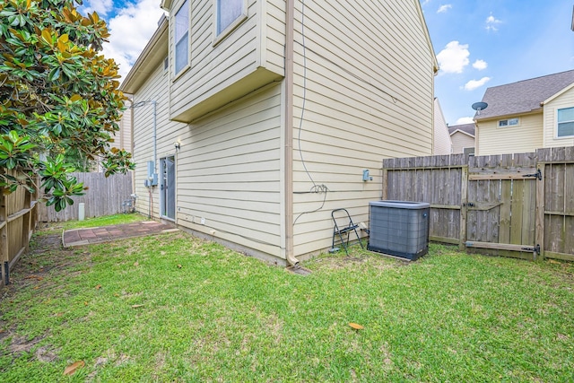 2212 Naomi St, Houston, TX 77054 - view of home's exterior with a central AC unit and a fenced backyard