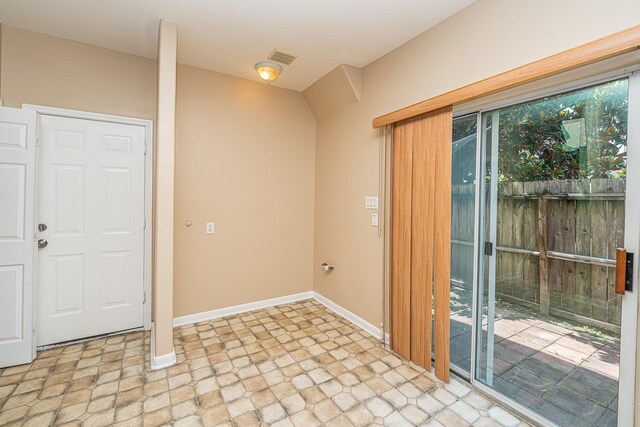 2212 Naomi St, Houston, TX 77054 - unfurnished room featuring baseboards and light stone finish flooring