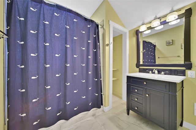 423 Pecore St, Houston, TX 77009 - full bath featuring marble look tile flooring, vanity, and curtained shower