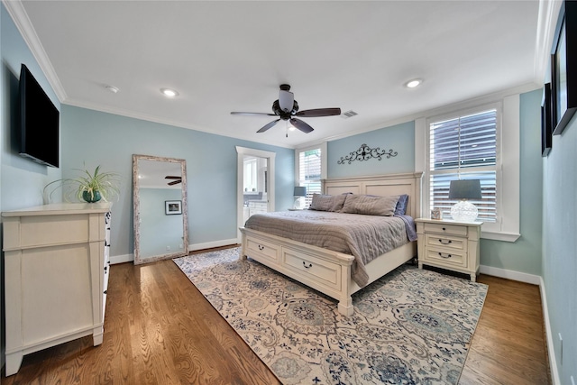 423 Pecore St, Houston, TX 77009 - bedroom featuring crown molding, wood finished floors, recessed lighting, ceiling fan, and connected bathroom
