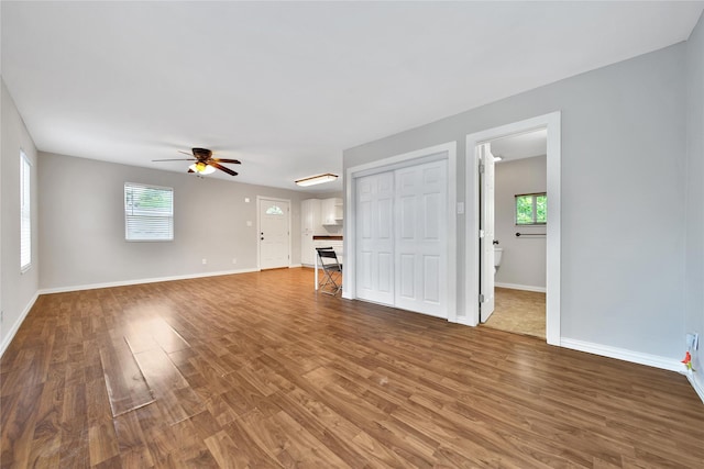 423 Pecore St, Houston, TX 77009 - unfurnished living room featuring wood finished floors and ceiling fan