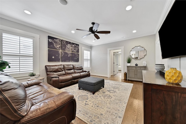 423 Pecore St, Houston, TX 77009 - living room with ceiling fan, recessed lighting, wood finished floors, and ornamental molding
