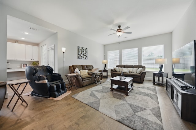 3601 Haskell Hollow Loop, College Station, TX 77845 - living area with a ceiling fan, light wood-style floors, and recessed lighting