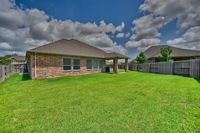 3601 Haskell Hollow Loop, College Station, TX 77845 - rear view of property with brick siding and a shingled roof