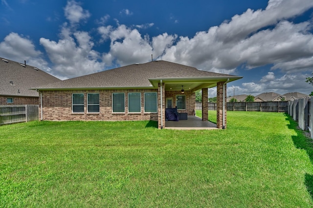 3601 Haskell Hollow Loop, College Station, TX 77845 - back of property featuring a patio area, brick siding, a ceiling fan, and a shingled roof