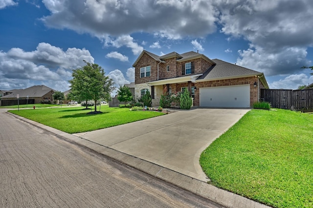 3601 Haskell Hollow Loop, College Station, TX 77845 - view of front of property with driveway, a garage, and brick siding