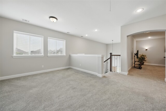 3601 Haskell Hollow Loop, College Station, TX 77845 - spare room with carpet flooring, baseboards, recessed lighting, and arched walkways