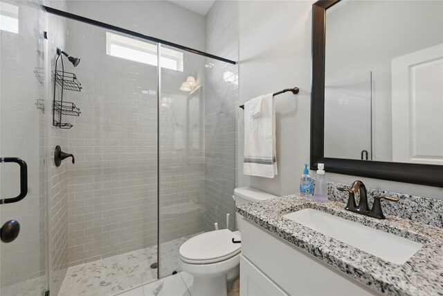 3601 Haskell Hollow Loop, College Station, TX 77845 - bathroom with vanity, toilet, and a shower stall