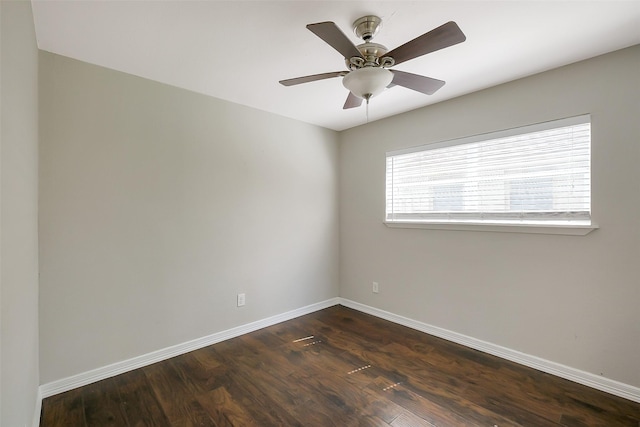 10422 Shadow Wood Dr, Houston, TX 77043 - empty room with baseboards, dark wood finished floors, and a ceiling fan
