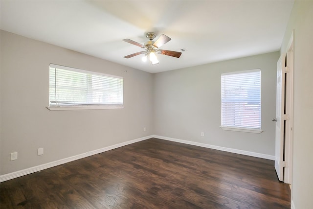 10422 Shadow Wood Dr, Houston, TX 77043 - unfurnished room featuring dark wood-style flooring, baseboards, and ceiling fan