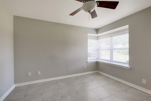 10422 Shadow Wood Dr, Houston, TX 77043 - empty room featuring baseboards, ceiling fan, and light tile patterned floors