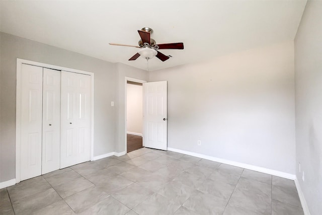 10422 Shadow Wood Dr, Houston, TX 77043 - unfurnished bedroom with baseboards, a closet, and ceiling fan