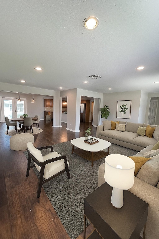 10422 Shadow Wood Dr, Houston, TX 77043 - living area with dark wood-style flooring and recessed lighting