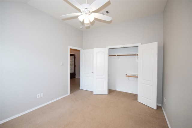446 De Coster Blvd, Alvin, TX 77511 - unfurnished bedroom featuring carpet flooring, lofted ceiling, a closet, baseboards, and a ceiling fan