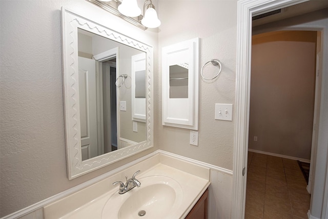 446 De Coster Blvd, Alvin, TX 77511 - bathroom featuring tile patterned flooring and vanity