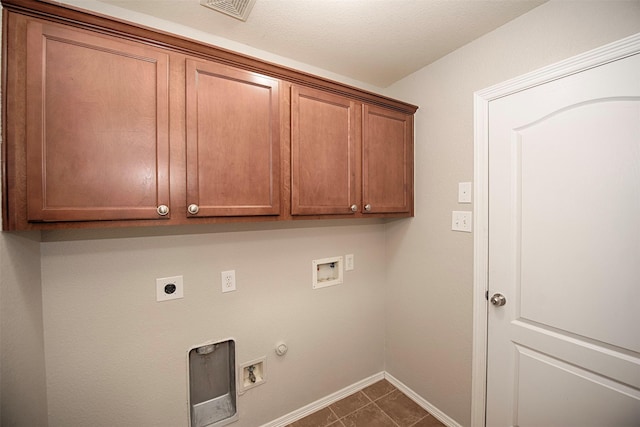 446 De Coster Blvd, Alvin, TX 77511 - laundry area with cabinet space, hookup for an electric dryer, washer hookup, gas dryer hookup, and baseboards