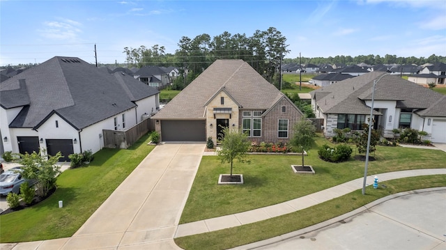24815 Pavonia Lake Ln, Tomball, TX 77375 - view of front facade featuring a residential view, an attached garage, and brick siding