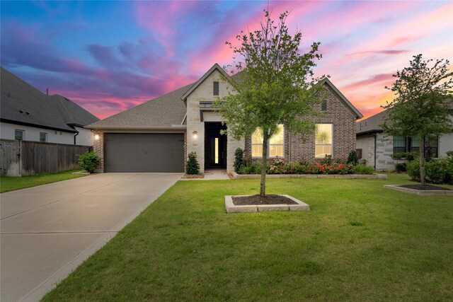 24815 Pavonia Lake Ln, Tomball, TX 77375 - view of front of property with brick siding, a garage, concrete driveway, and a shingled roof
