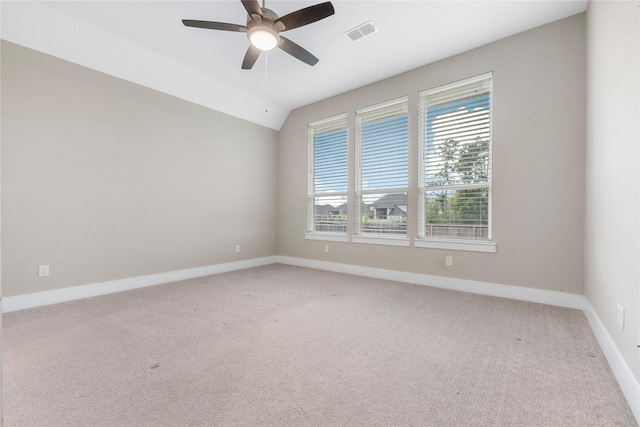24815 Pavonia Lake Ln, Tomball, TX 77375 - empty room with ceiling fan, light colored carpet, and lofted ceiling
