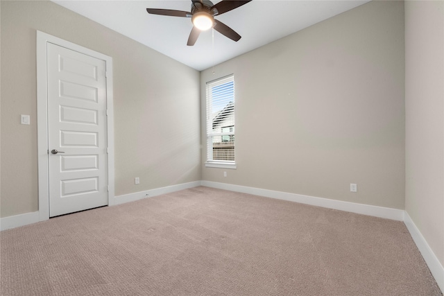24815 Pavonia Lake Ln, Tomball, TX 77375 - empty room featuring a ceiling fan and light colored carpet