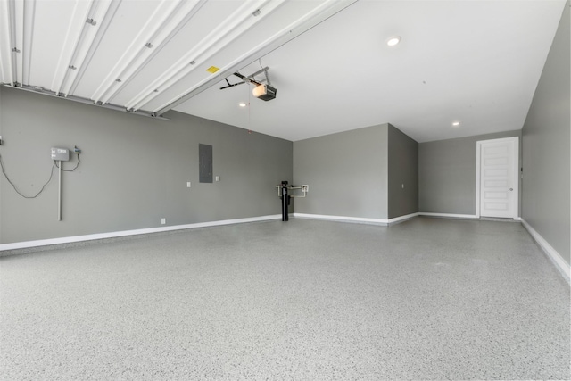 24815 Pavonia Lake Ln, Tomball, TX 77375 - garage featuring electric panel and a garage door opener