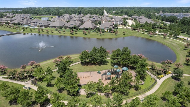 24815 Pavonia Lake Ln, Tomball, TX 77375 - aerial perspective of suburban area with a nearby body of water