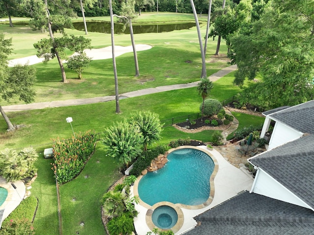 6611 Course View Ln, Spring, TX 77389 - view of pool featuring a water view, a lawn, view of golf course, and a pool with connected hot tub