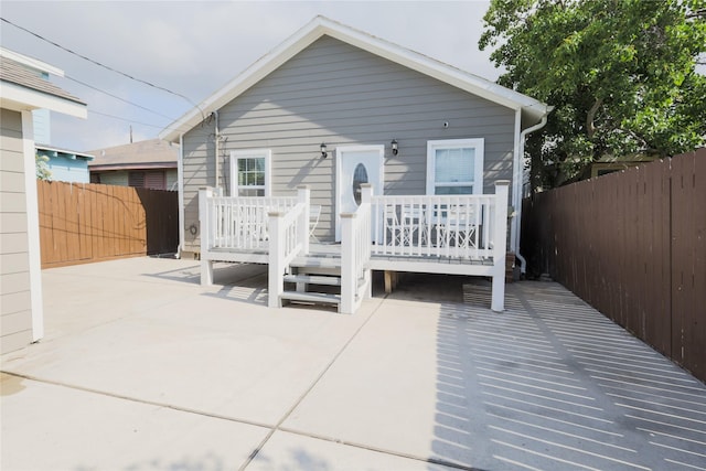 4023 Avenue S, Galveston, TX 77550 - back of property featuring a deck and a patio