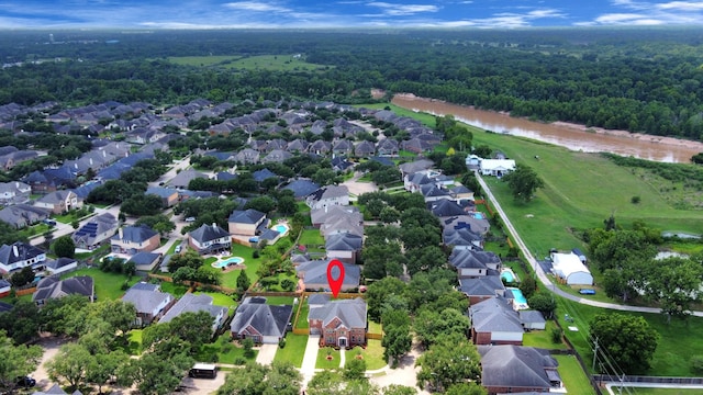 527 Little River Ct, Richmond, TX 77406 - aerial overview of property's location with a forest and nearby suburban area