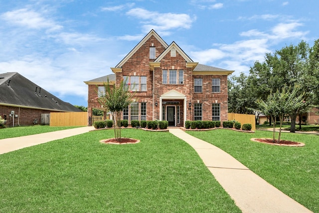 527 Little River Ct, Richmond, TX 77406 - colonial-style house featuring brick siding