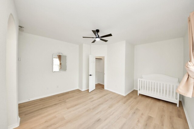 527 Little River Ct, Richmond, TX 77406 - bedroom featuring light wood finished floors, baseboards, and ceiling fan