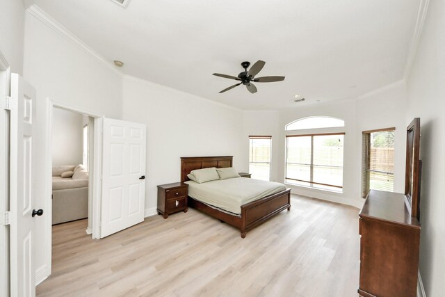 527 Little River Ct, Richmond, TX 77406 - bedroom with ornamental molding, light wood finished floors, baseboards, and a ceiling fan