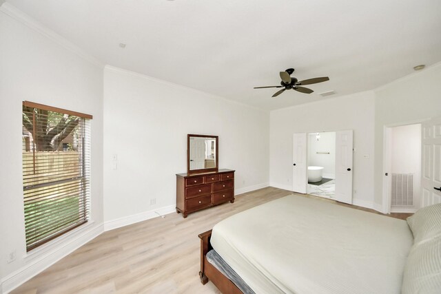 527 Little River Ct, Richmond, TX 77406 - bedroom with crown molding, light wood-type flooring, baseboards, ensuite bath, and a ceiling fan