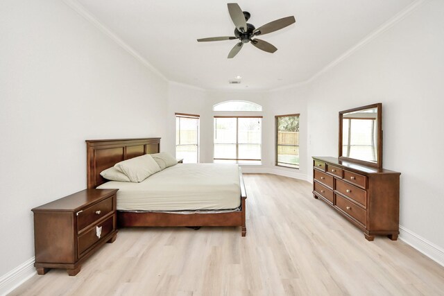 527 Little River Ct, Richmond, TX 77406 - bedroom featuring ornamental molding, light wood-type flooring, baseboards, and a ceiling fan