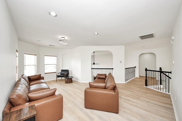527 Little River Ct, Richmond, TX 77406 - living area featuring light wood finished floors, baseboards, a ceiling fan, and recessed lighting