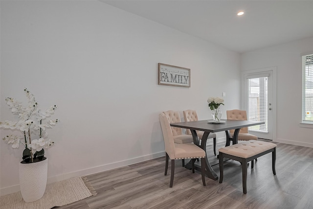 12319 Brandenburg Gate Dr, Houston, TX 77047 - dining room featuring light wood-style flooring, baseboards, and recessed lighting