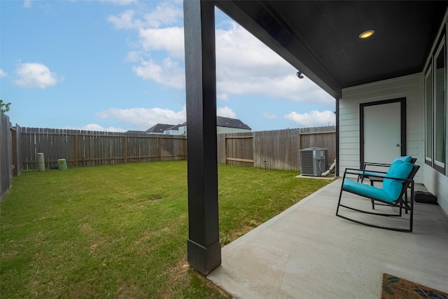 12319 Brandenburg Gate Dr, Houston, TX 77047 - view of yard featuring central AC and a patio area