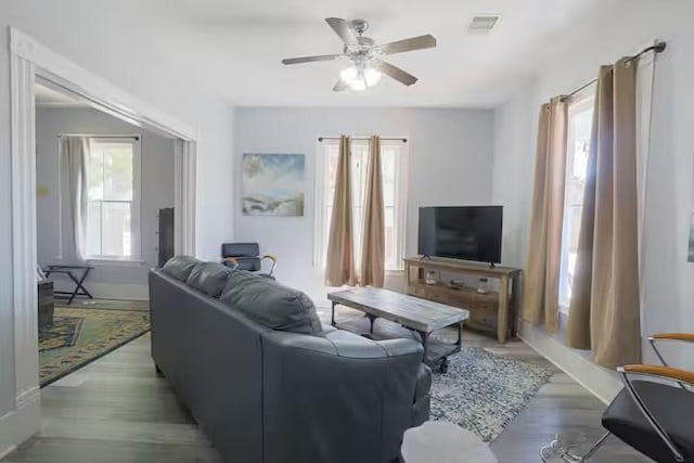 1514 18th St, Galveston, TX 77550 - living room with plenty of natural light, ceiling fan, and light wood finished floors