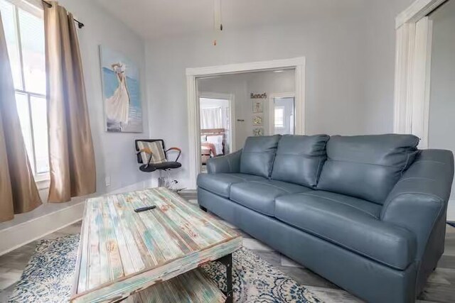 1514 18th St, Galveston, TX 77550 - living room featuring ceiling fan