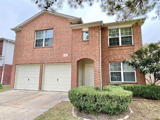 17419 Prospect Meadows Dr, Houston, TX 77095 - view of front of property featuring concrete driveway, brick siding, and a garage