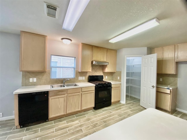 17419 Prospect Meadows Dr, Houston, TX 77095 - kitchen with black appliances, a sink, light brown cabinets, and decorative backsplash
