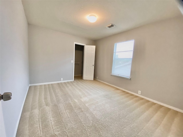 17419 Prospect Meadows Dr, Houston, TX 77095 - unfurnished bedroom featuring baseboards and carpet floors