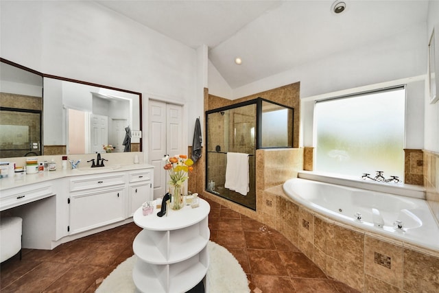 7923 Vintage Creek Dr, Spring, TX 77379 - full bath with a jetted tub, a shower stall, lofted ceiling, and vanity