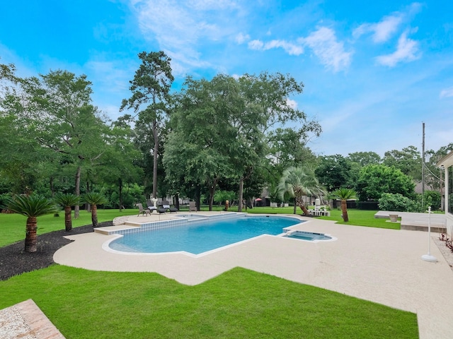 23226 Oak Hollow Ln, Tomball, TX 77377 - swimming pool featuring a yard, an in-ground hot tub, a patio area, and view of wooded area